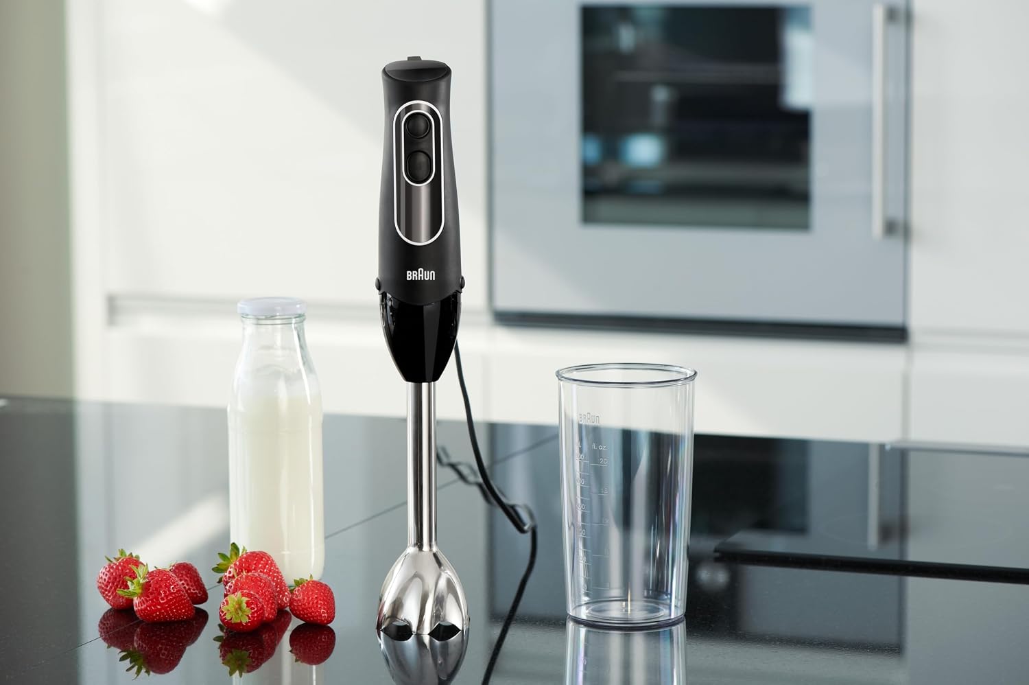 Braun MQ505 displayed with its whisk, beaker, and ingredients