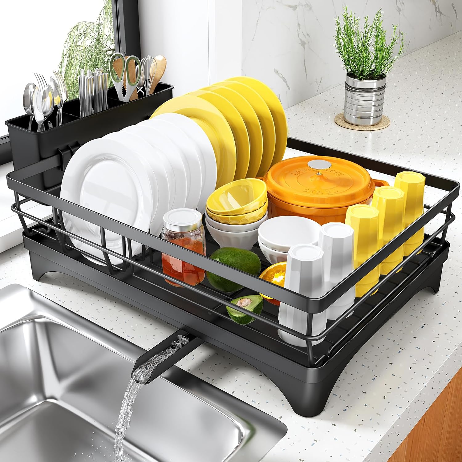 SNTD dish rack with drainage spout beside a sink