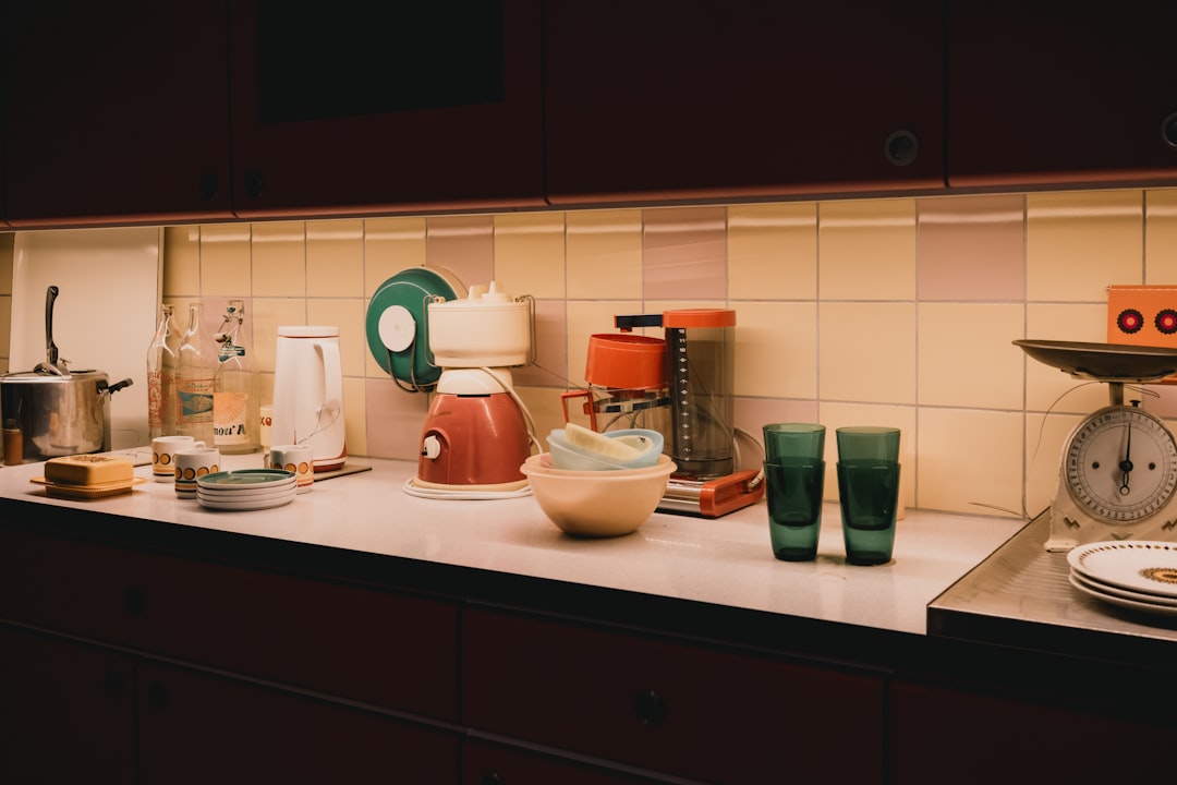 Kitchen counter with everyday appliances and glasses, illustrating how permanent items reduce usable prep space