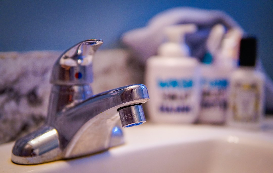 Bathroom sink and faucet, representing a high-use surface that benefits from frequent maintenance