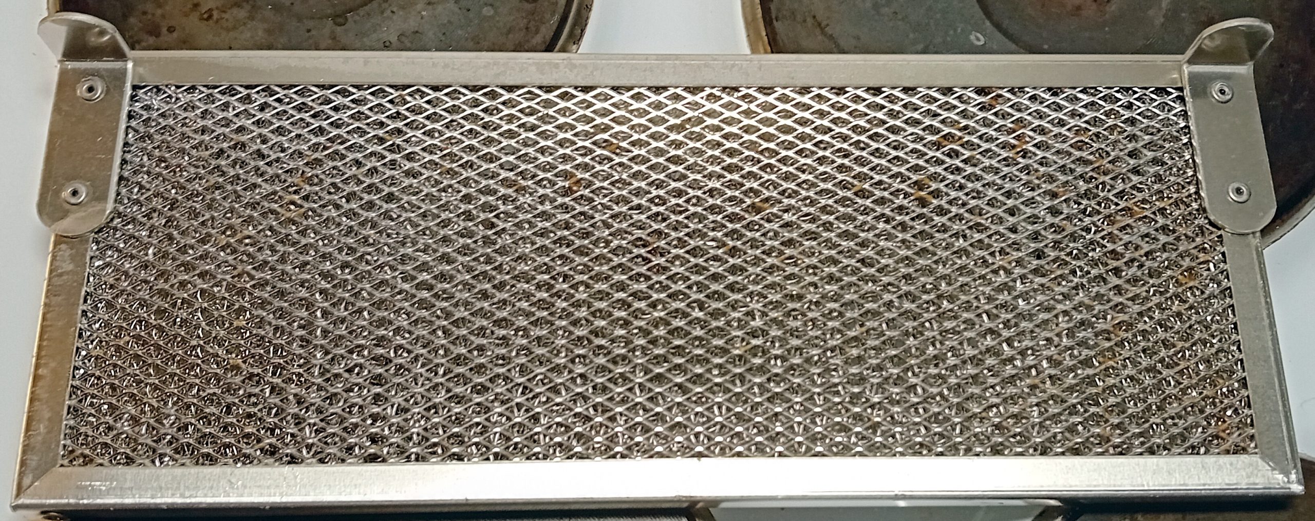 Metal kitchen hood filter after cleaning