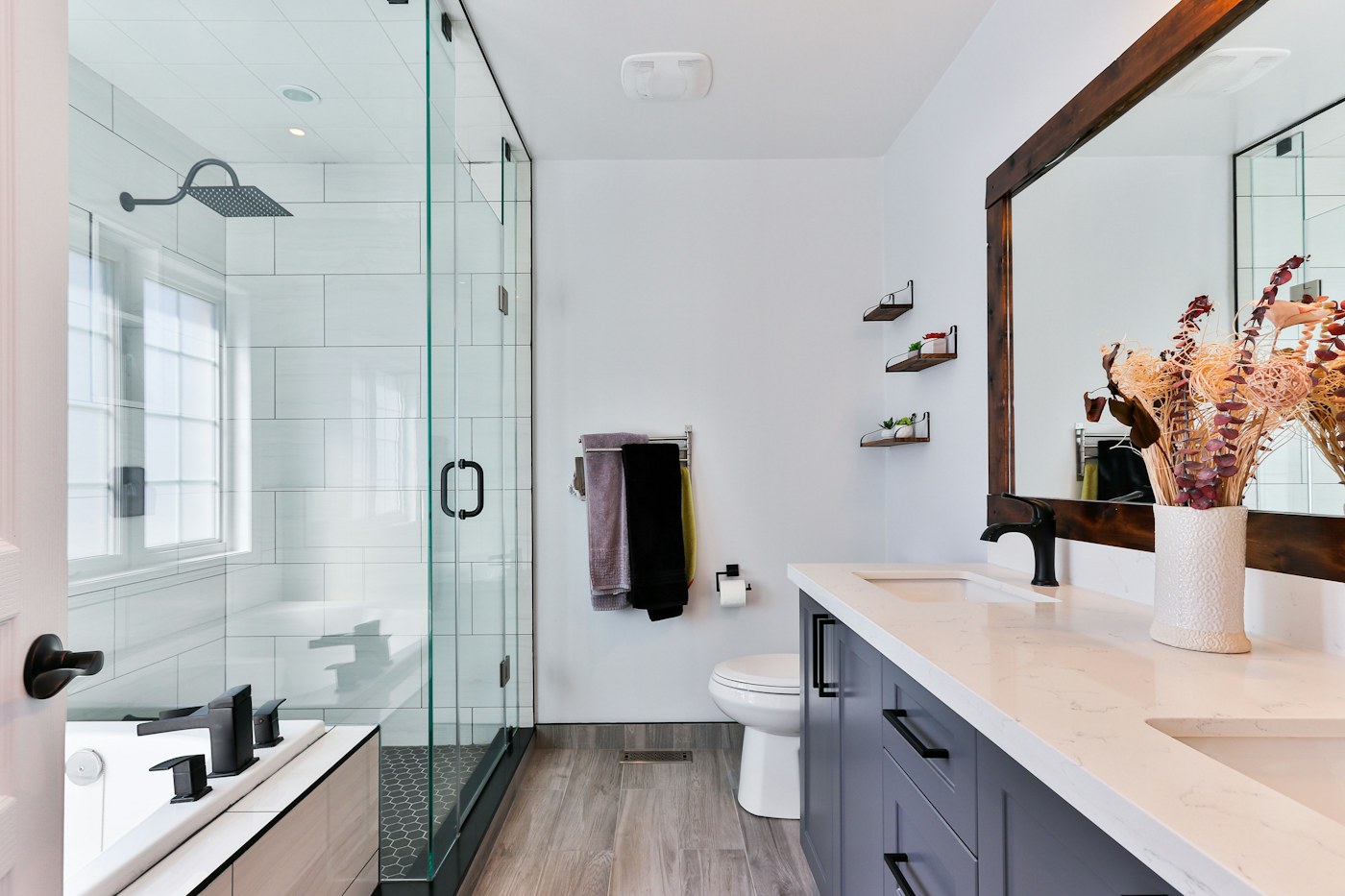 Small bathroom using cabinet and wall storage around the vanity