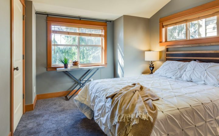 Bedroom with open floor space around the bed for easier cleaning