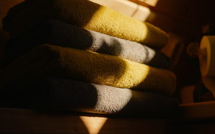 Folded household textiles stacked neatly before storage