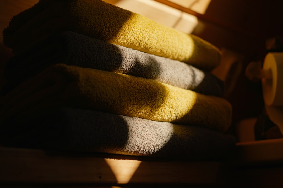 Folded household textiles stacked neatly before storage