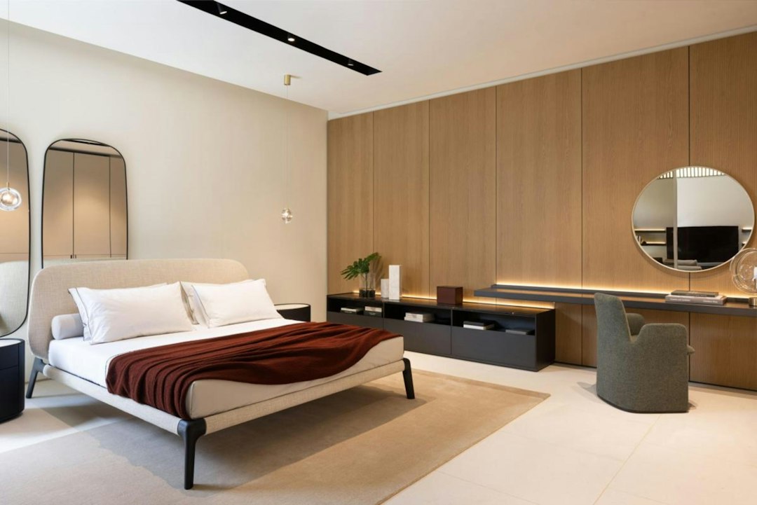 Bedroom with work surface kept within one defined wall zone