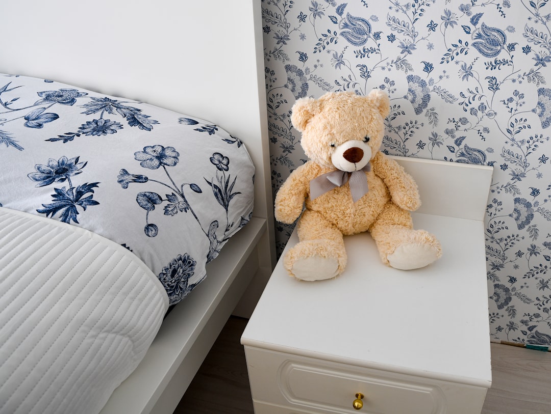 Neatly made bedroom illustrating the benefit of controlled hidden storage
