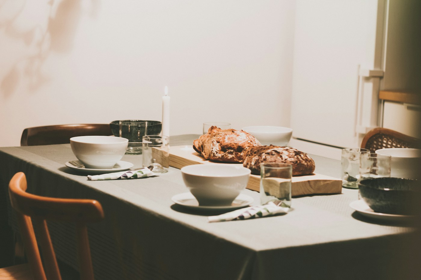 Dining table with multiple chairs in active use
