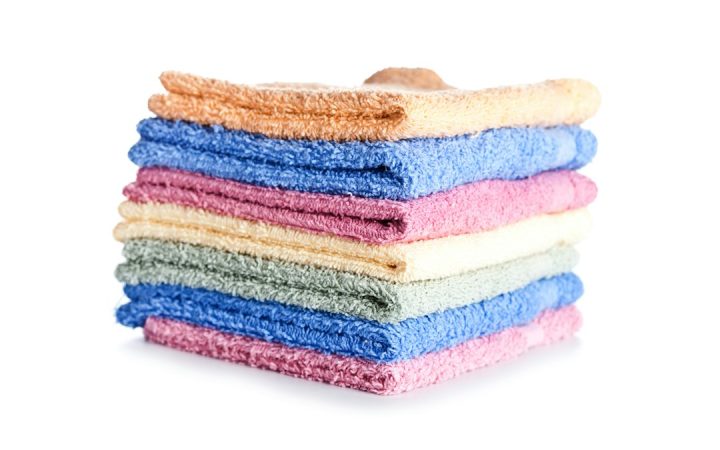 Stack of clean reusable cloths stored together for household cleaning