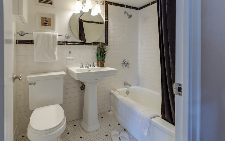 Small bathroom with clear floor space and minimal visual clutter