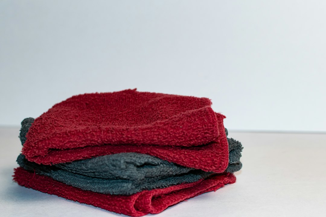 Red and gray reusable cloths stacked together for organized storage