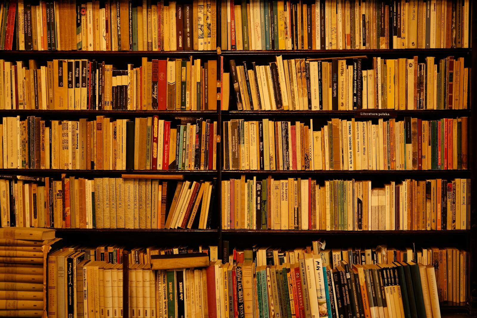 a book shelf filled with lots of books