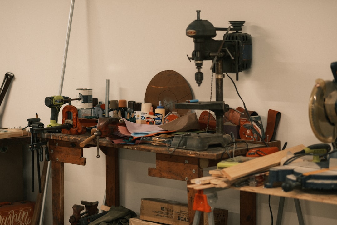 Small workbench covered with active tools and project materials