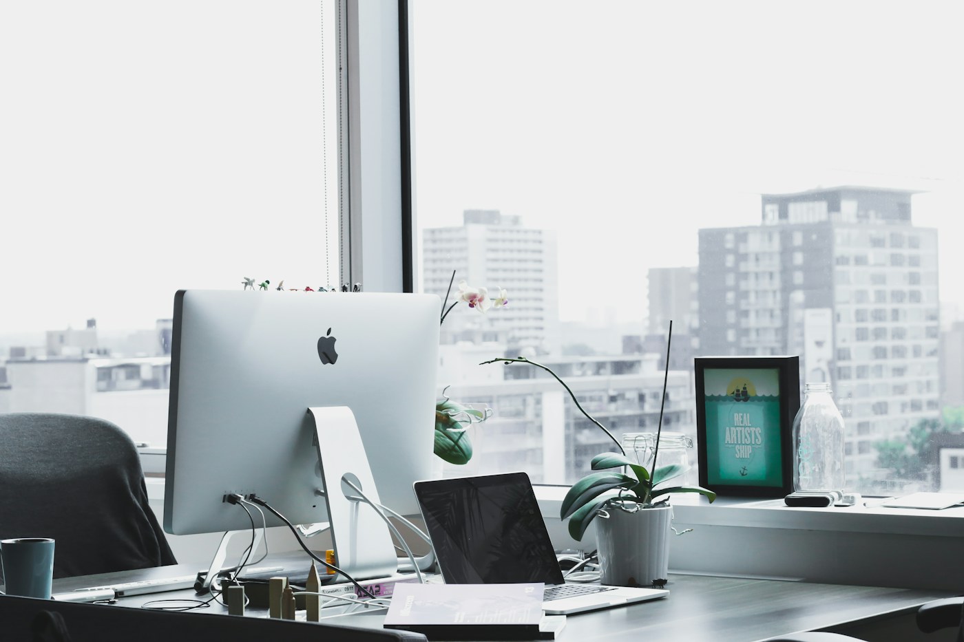 Small office desk showing why daily tools need close access