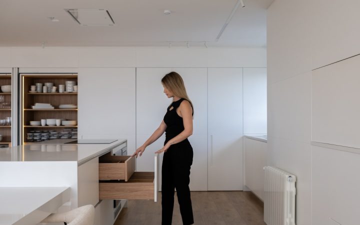 Organized kitchen drawer showing compact category storage