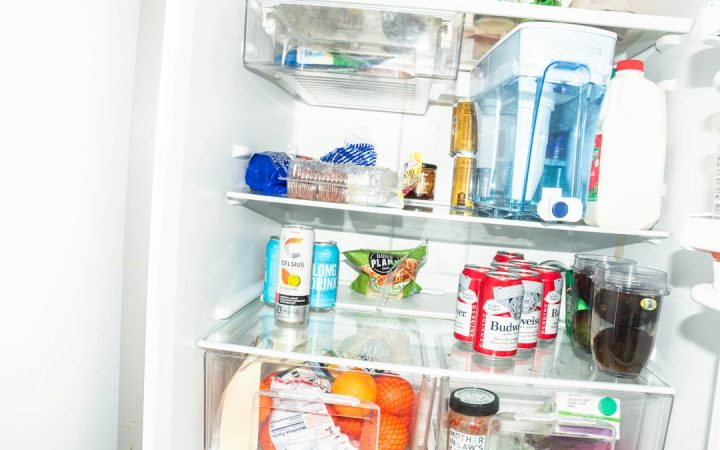 Full refrigerator illustrating why visible food zones and breathing room matter