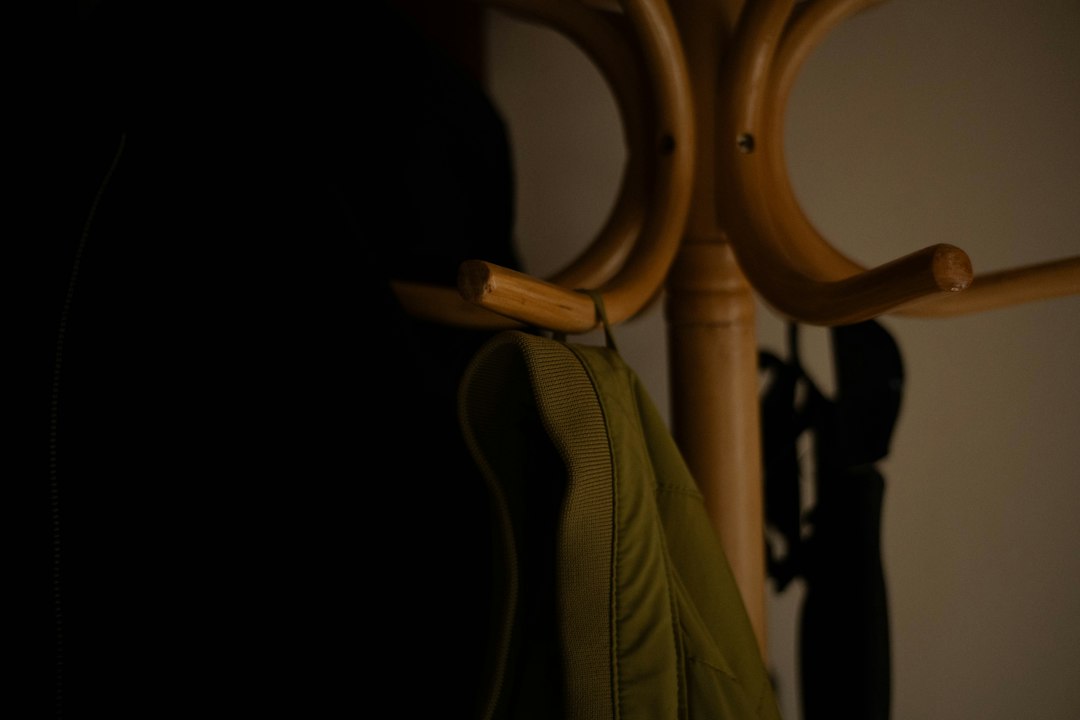 Simple coat rack illustrating a small vertical gear-storage footprint