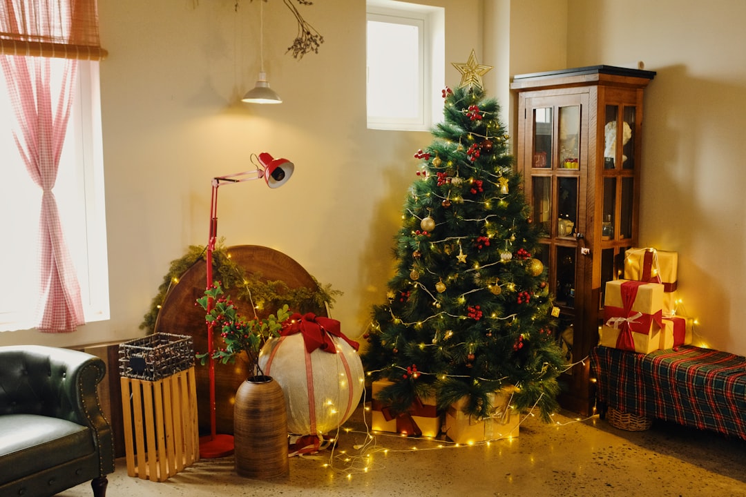Cozy room with a decorated tree and gifts showing how seasonal decor uses visible space
