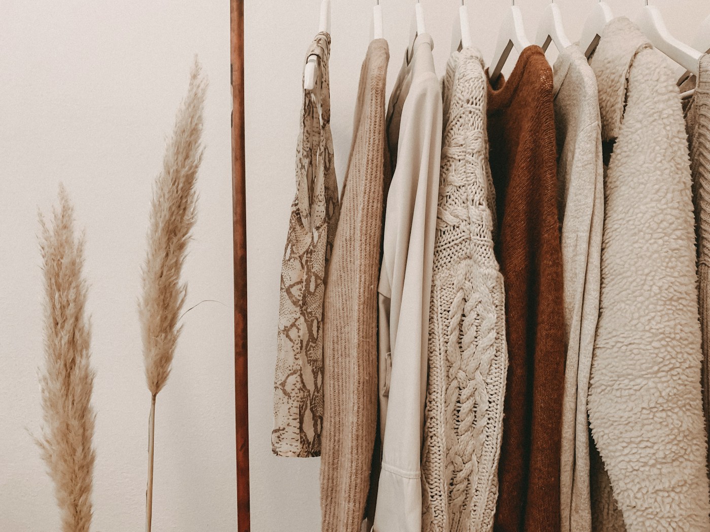 Clothing hanging neatly on a compact rack