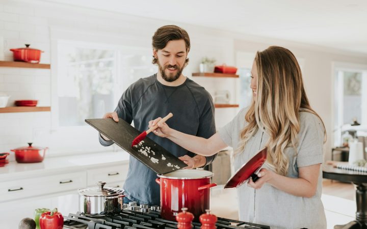Small kitchen organized around repeated cooking and meal-prep tasks
