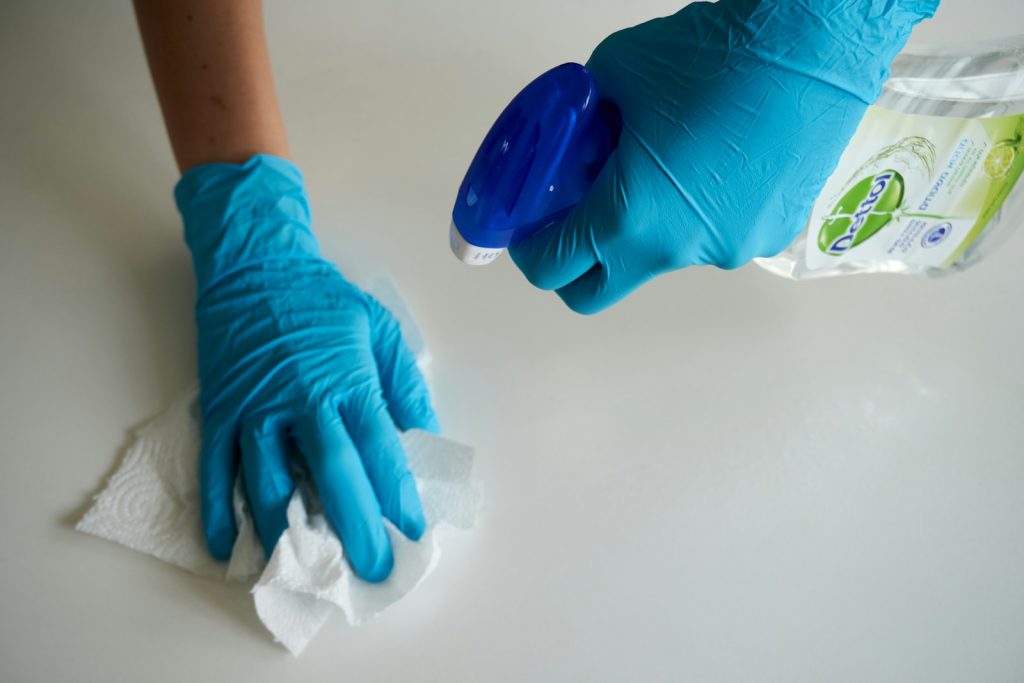 Portable cleaning supplies organized for use around a small home