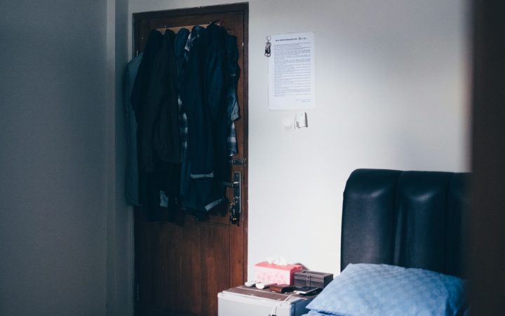 Organized wardrobe in a compact bedroom