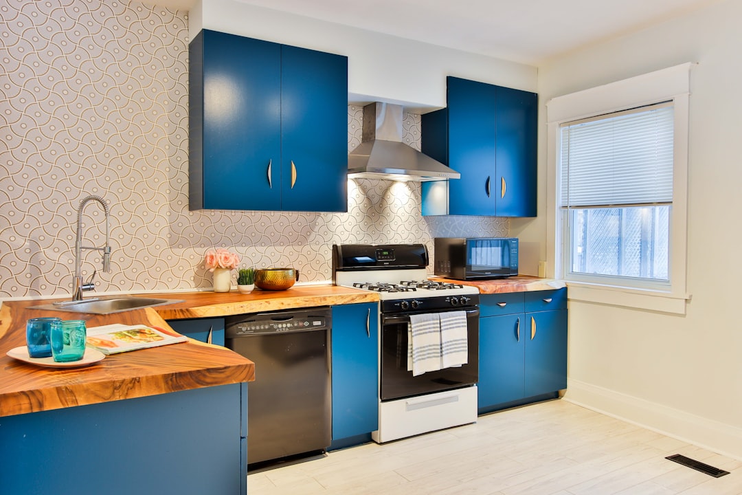 Compact kitchen with limited cabinetry and clear counter space