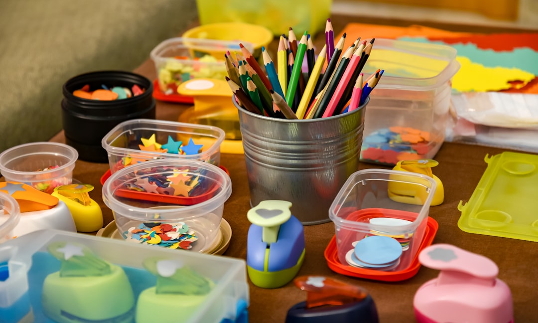 Craft table with colorful art materials ready for a children’s project