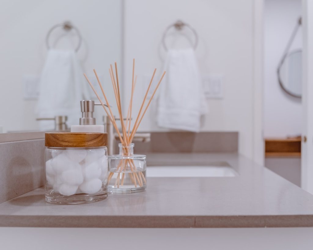 Bathroom vanity with a small number of neatly arranged daily items