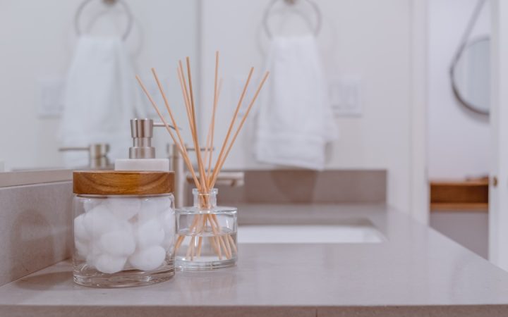 Bathroom vanity with a small number of neatly arranged daily items