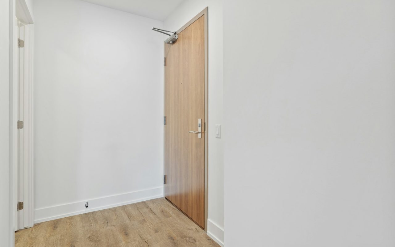 Small entry area with limited wall and floor space for active family gear