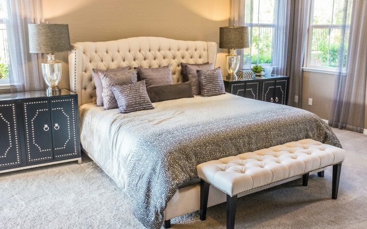 Neat small bedroom with accessible space beneath the bed