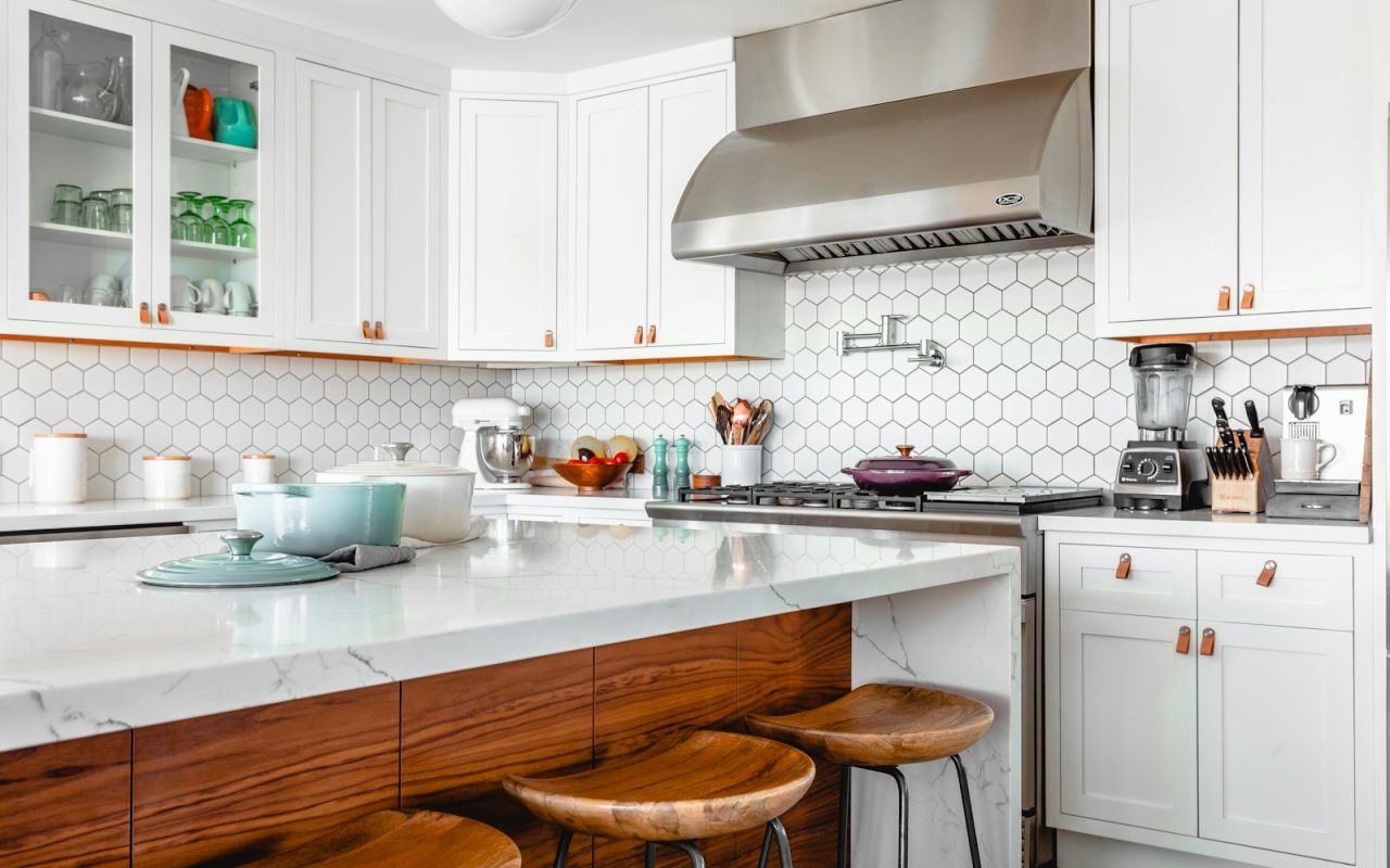 Compact kitchen with organized cabinetry and drawers