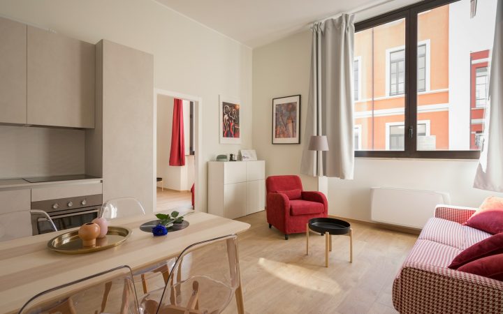 Small rental apartment where doors and vertical surfaces must work hard