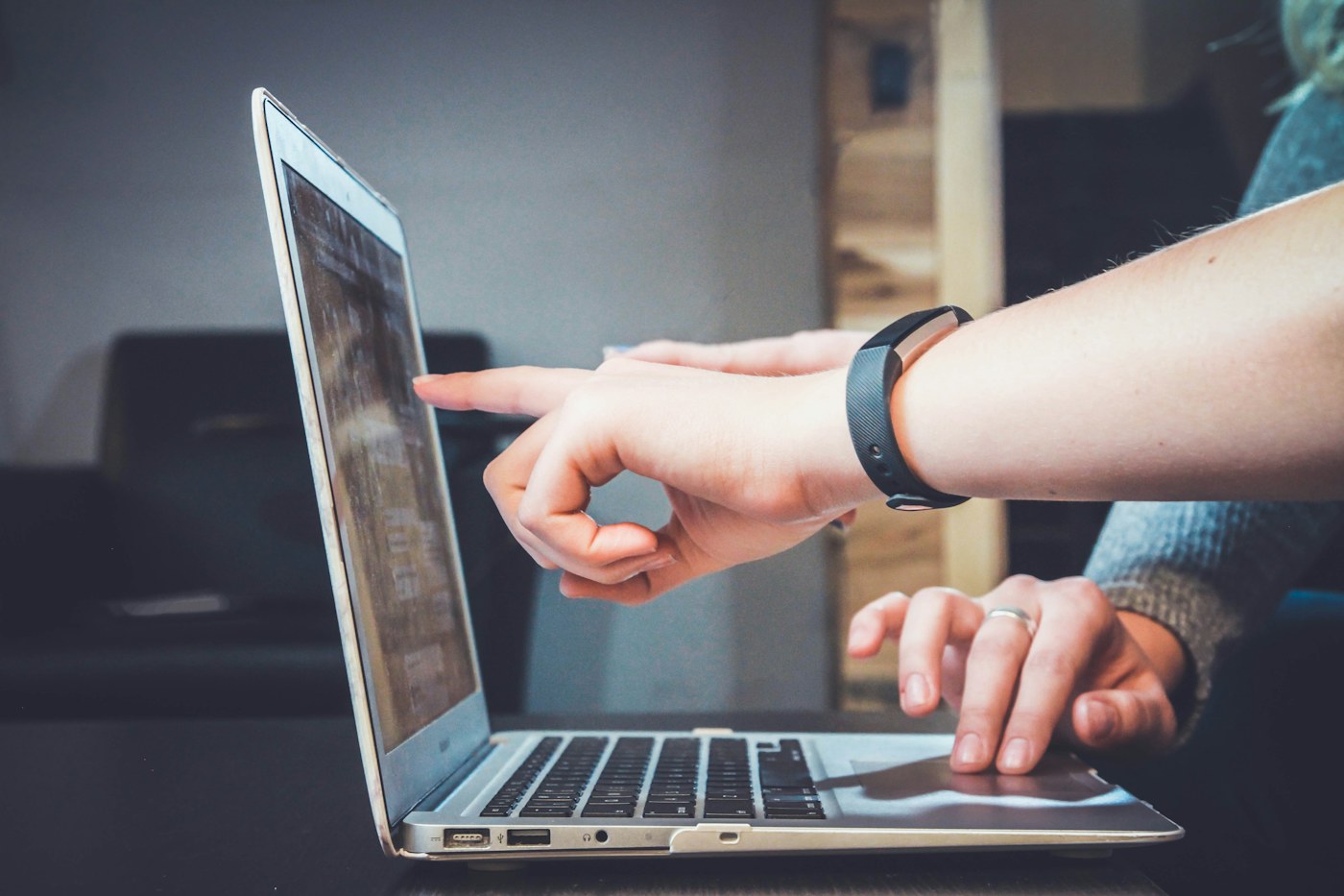 Laptop and devices representing household charging demand