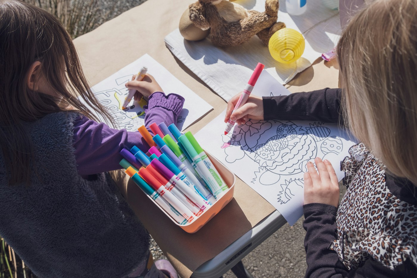 Children drawing together, illustrating the volume of meaningful paper created during childhood