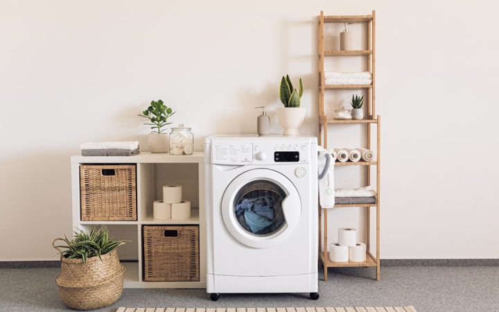 Washer and dryer in a small laundry room with limited storage