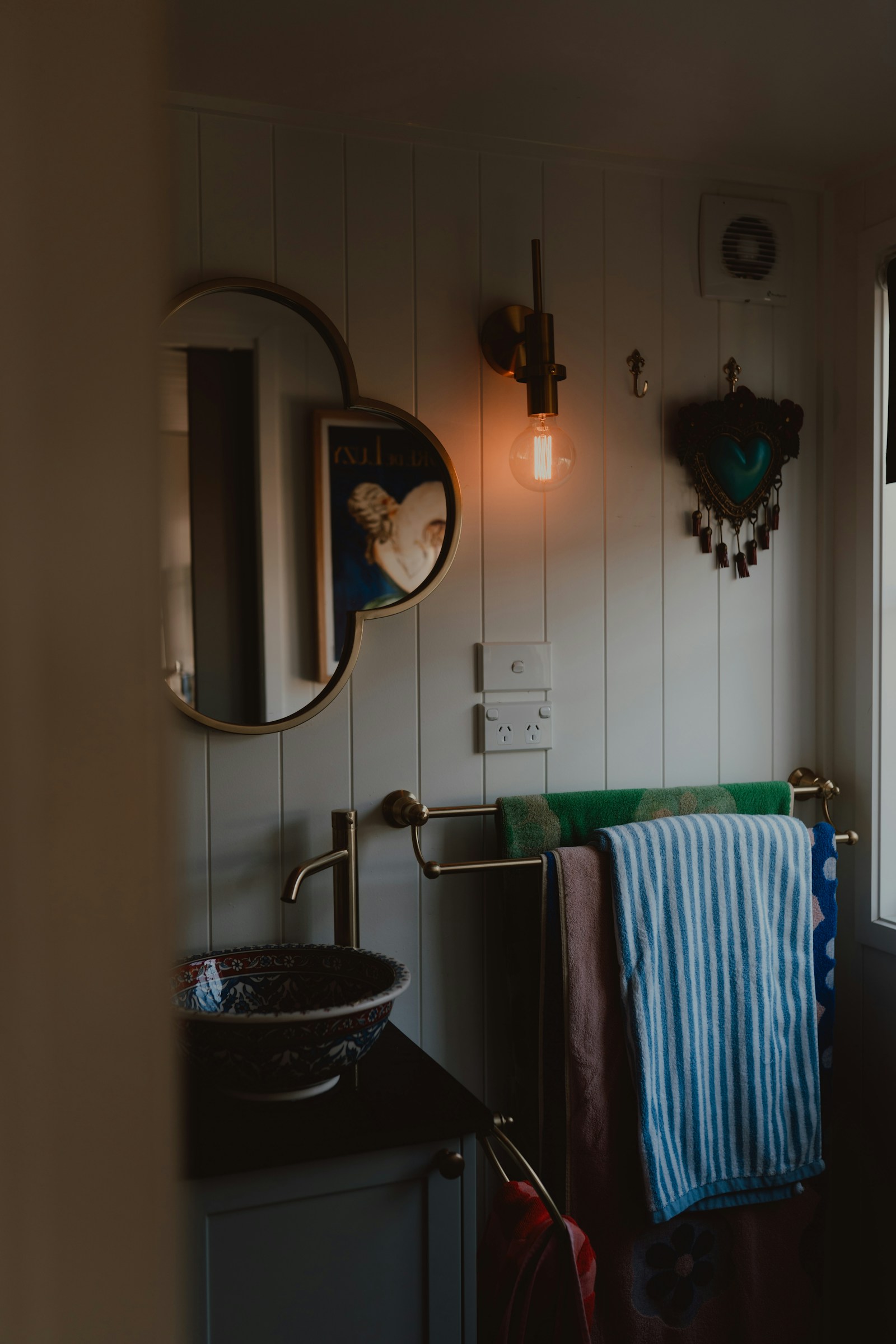Bathroom mirror and warm pendant lighting