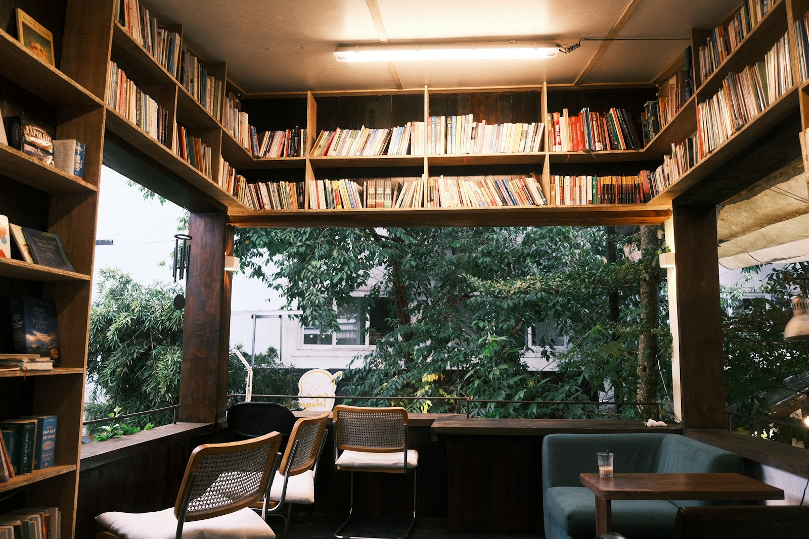 Reading area with bookshelves and chairs