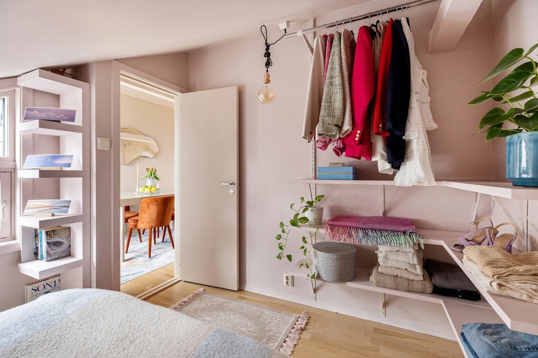 Small bedroom showing how storage and furniture share limited floor area