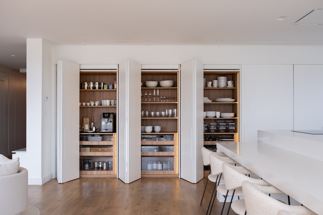 Compact kitchen cabinetry illustrating food storage without a separate pantry
