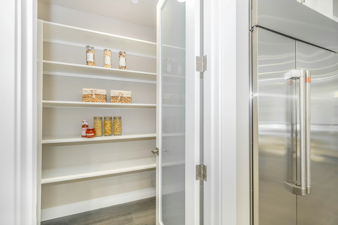 Pantry shelves illustrating broad category storage and visible inventory