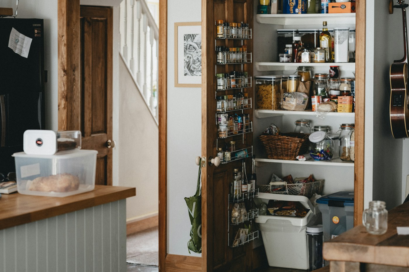 Narrow household shelving illustrating low-frequency vertical storage