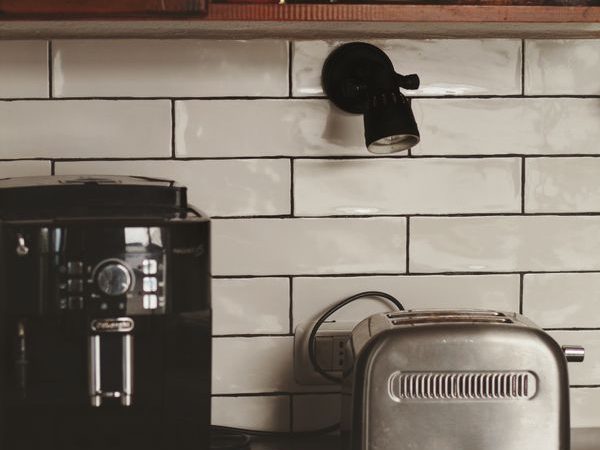 Compact kitchen counter with a coffee maker and toaster showing the space used by everyday appliances
