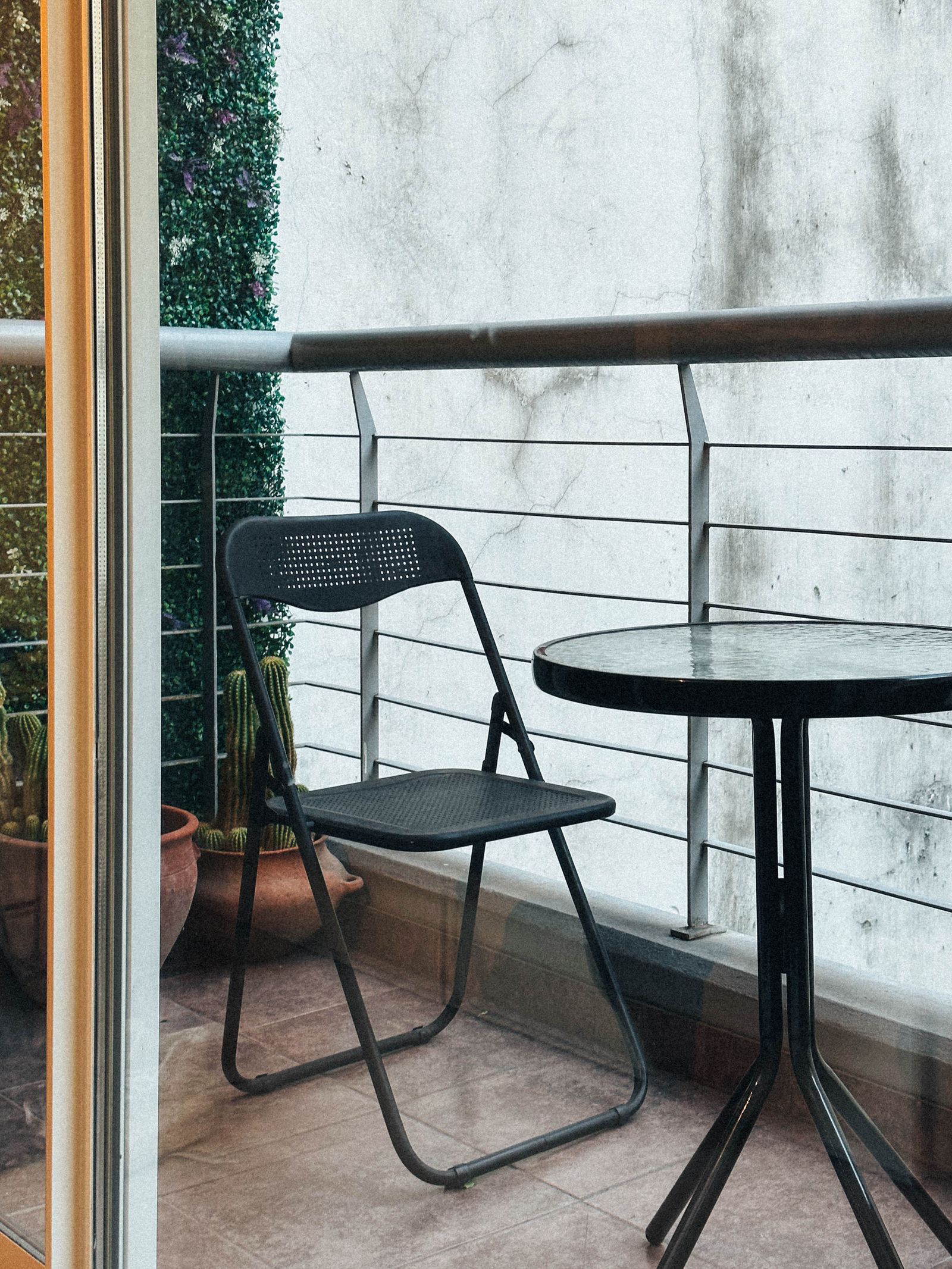 Plan a Tiny Balcony Around the Door, Chair, and Table You Actually Use