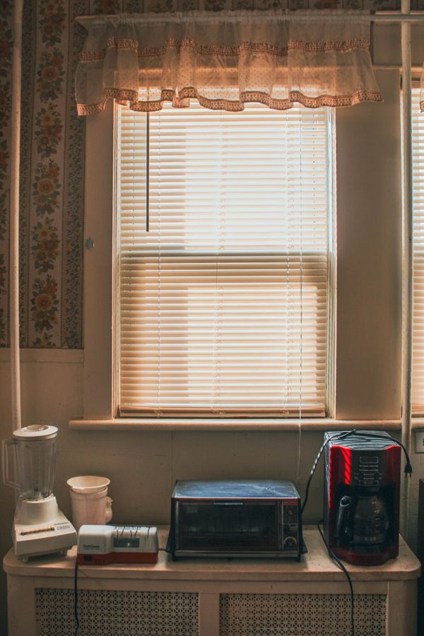 Kitchen counter with blender, toaster oven, and coffee maker illustrating appliance footprint