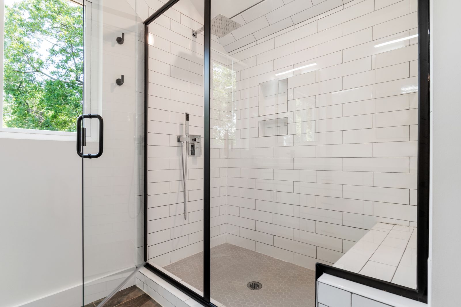 Glass shower door in a bathroom