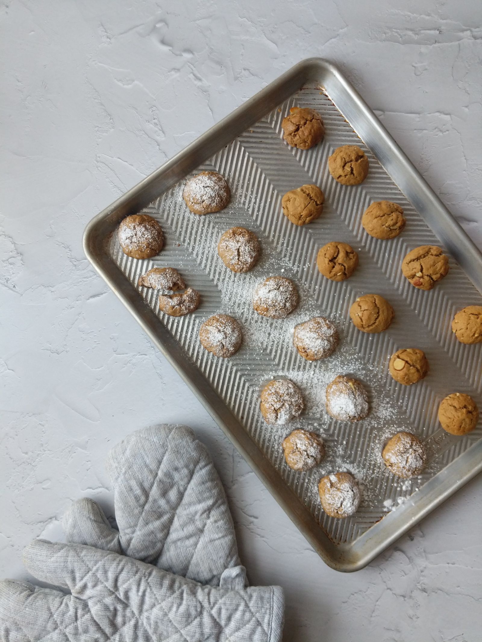 A baking sheet holding a mixture of small pastries