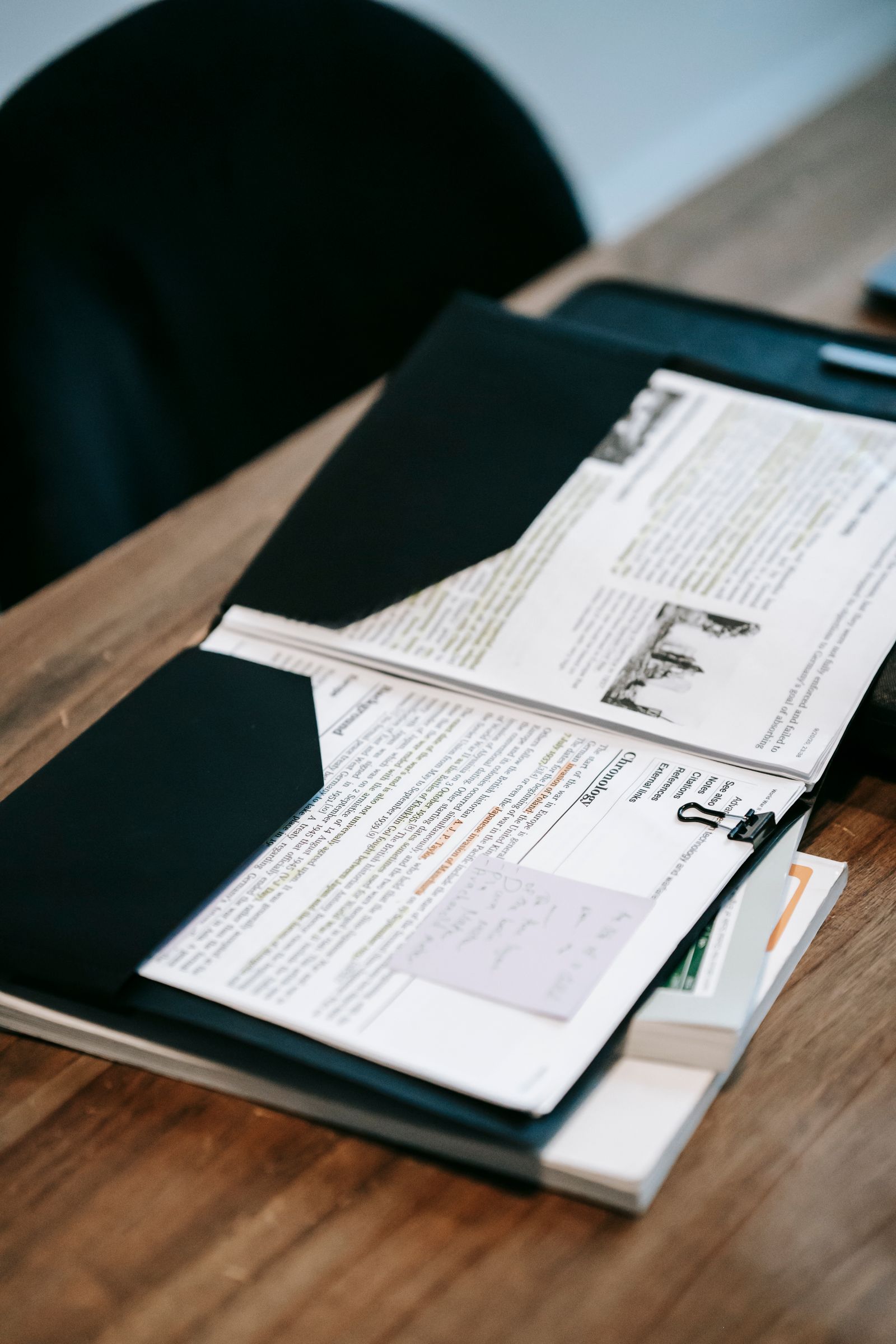 Open folder with organized household papers