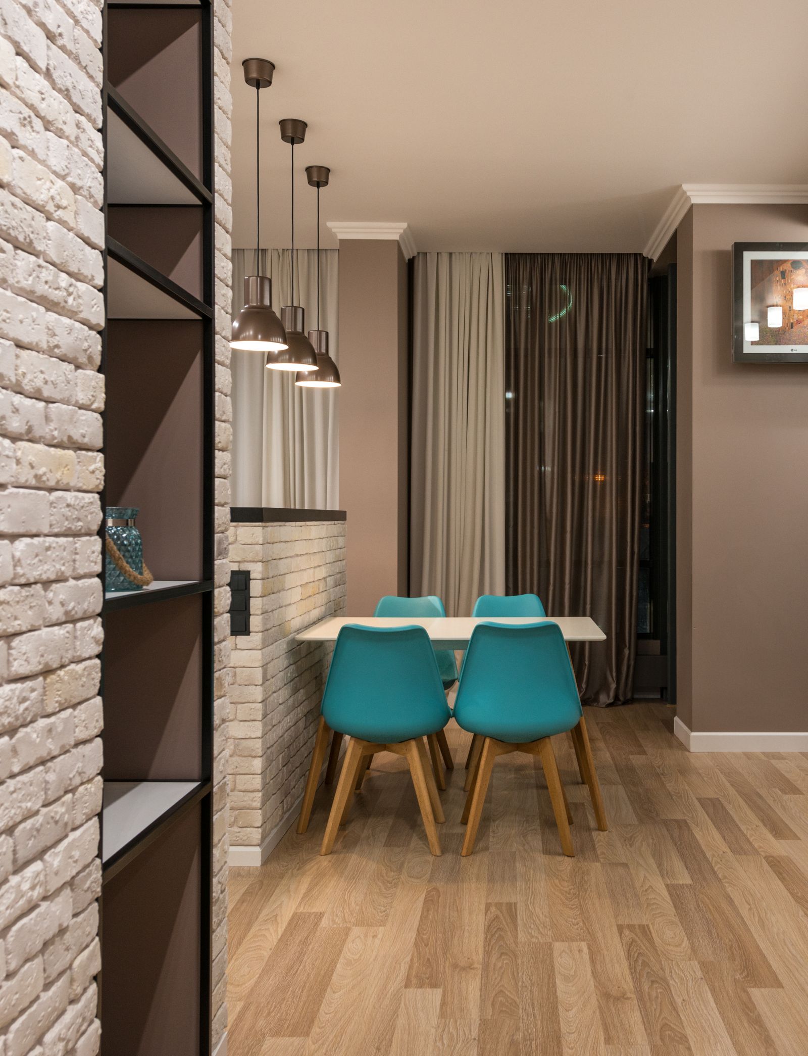Dining chairs positioned around a table near a window